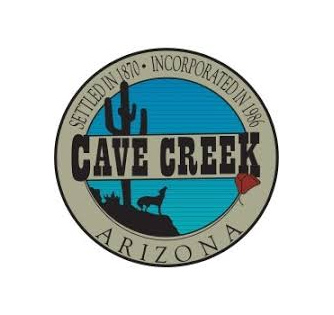 Cave Creek, Arizona logo featuring a cactus, a silhouette of a coyote, and a red flower, symbolizing the town's desert landscape and history.